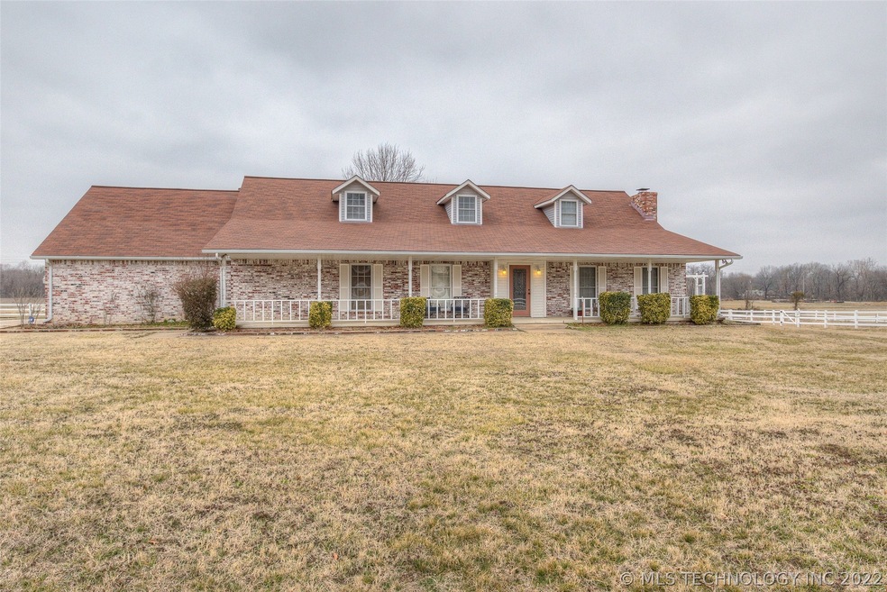 East facing covered front porch. overlooking large
