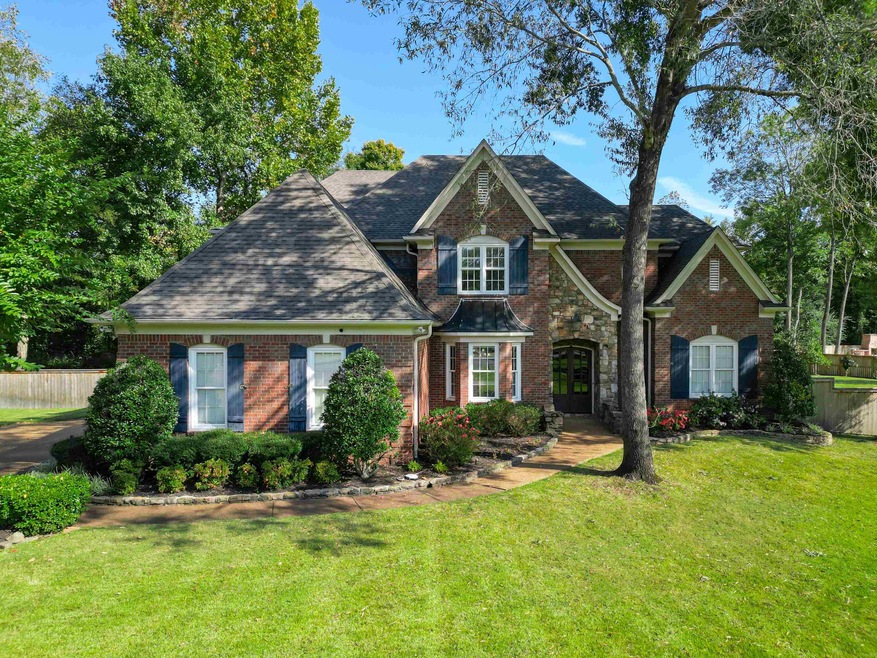 View of front of home featuring a front lawn