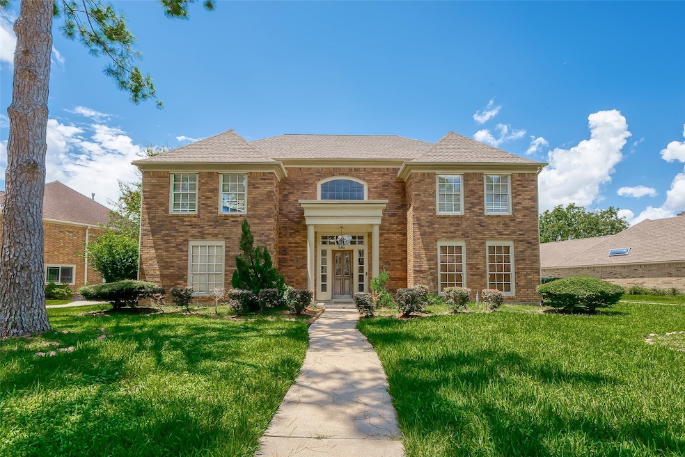 Welcome to this charming two-story brick exterior