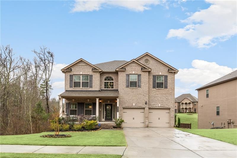 Beautiful brick front home with a charming front p