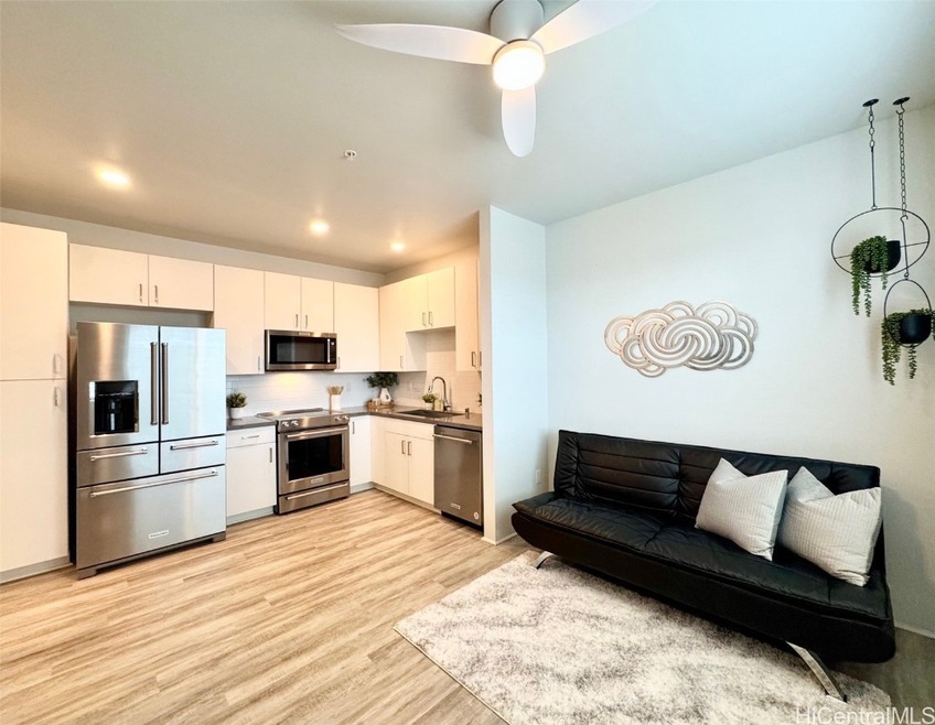 KAIKEA'S STYLISH OPEN CONCEPT LIVING W/ HIGH CEILI