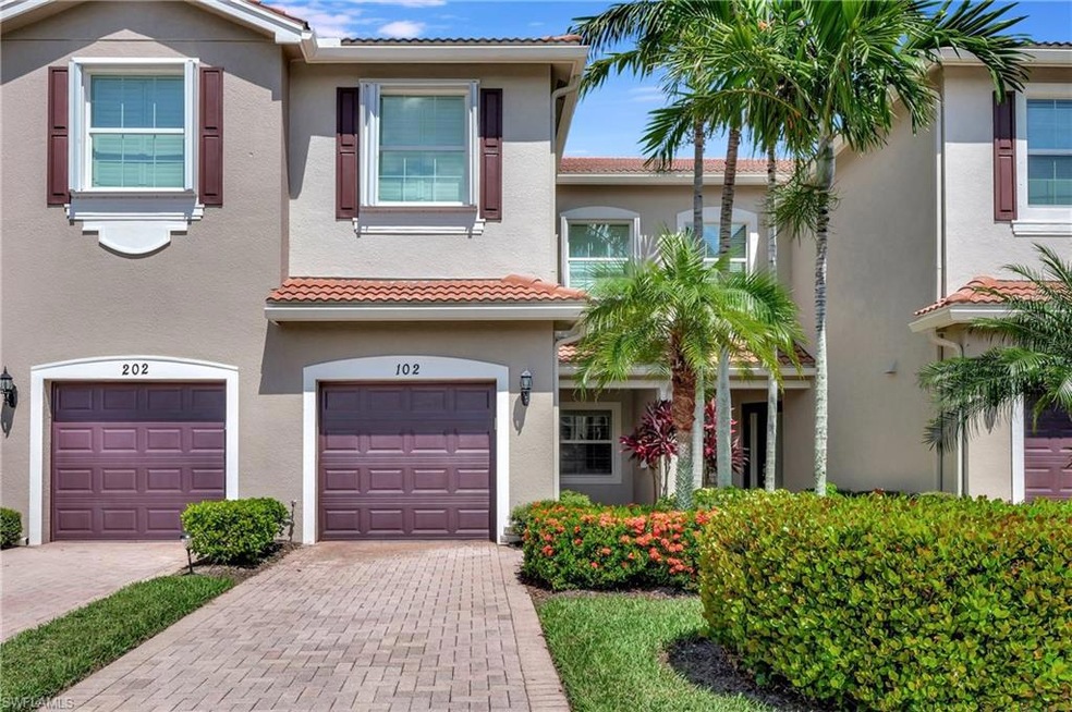 Meticulously Manicured Entrance and Garage