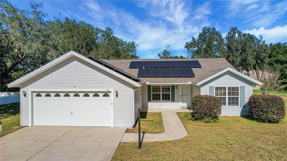 1203 Laurel Oak Ln, Lady Lake, FL 32159 - photo 1