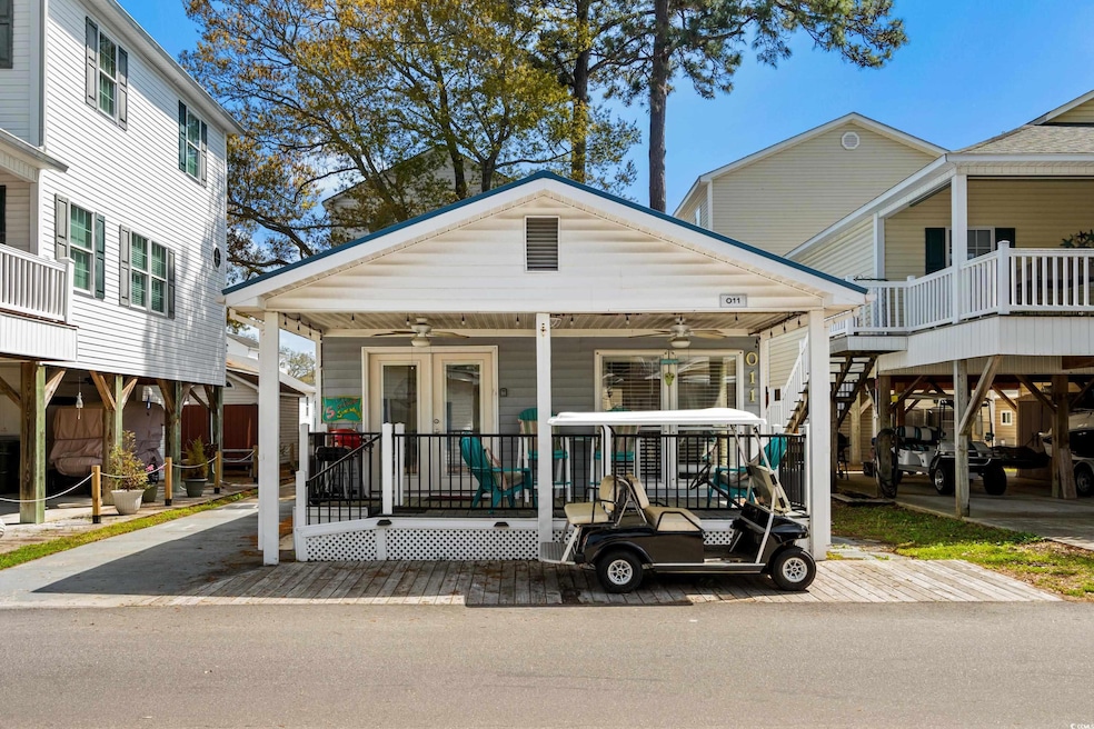 View of front of property featuring french doors, 