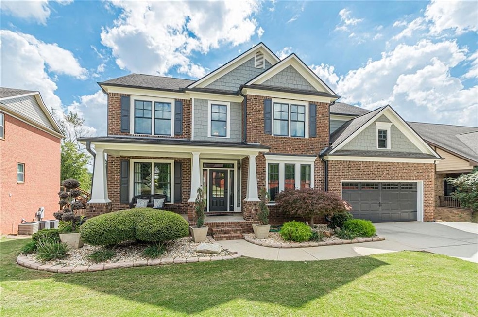 Craftsman inspired home featuring a garage, centra