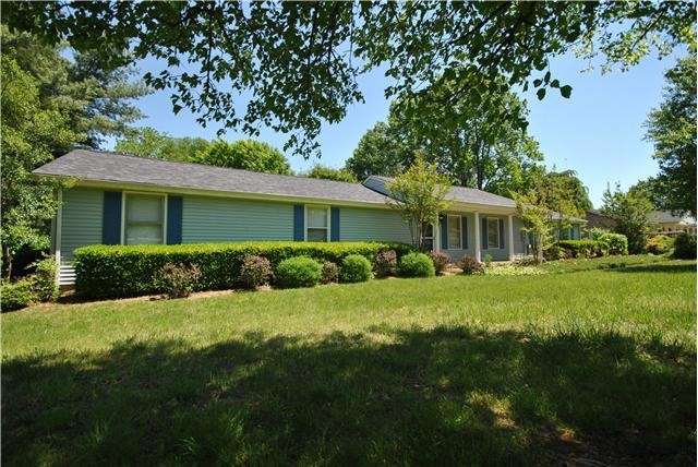 Home sweet home! Sit back and relax on this rocking-chair front porch.