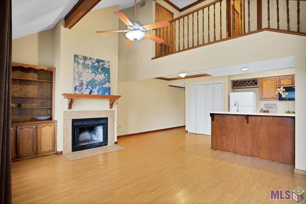 Tiled floors in the Kitchen, laminate in the Den. 