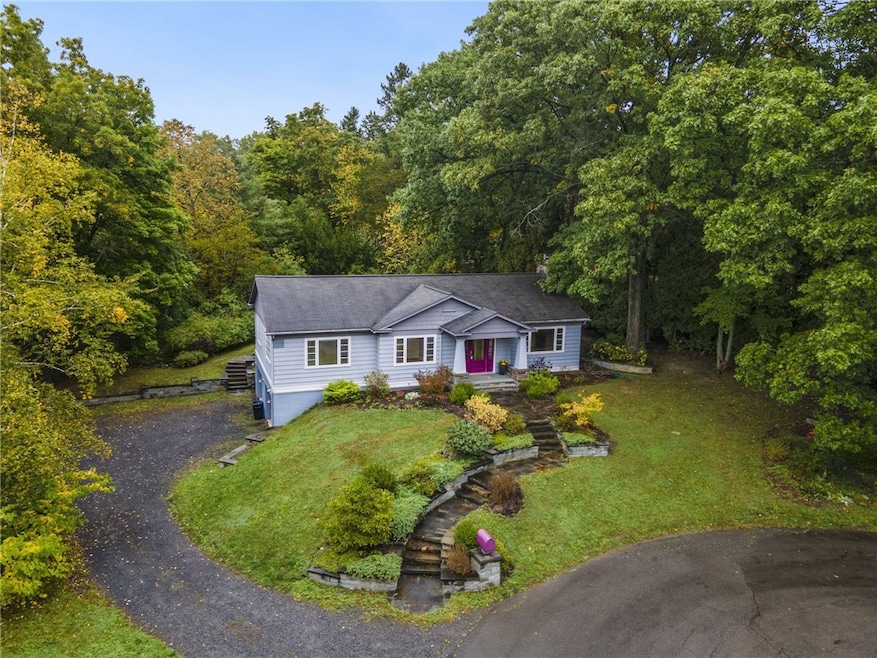 Stunning bungalow tucked away in Cayuga Heights.