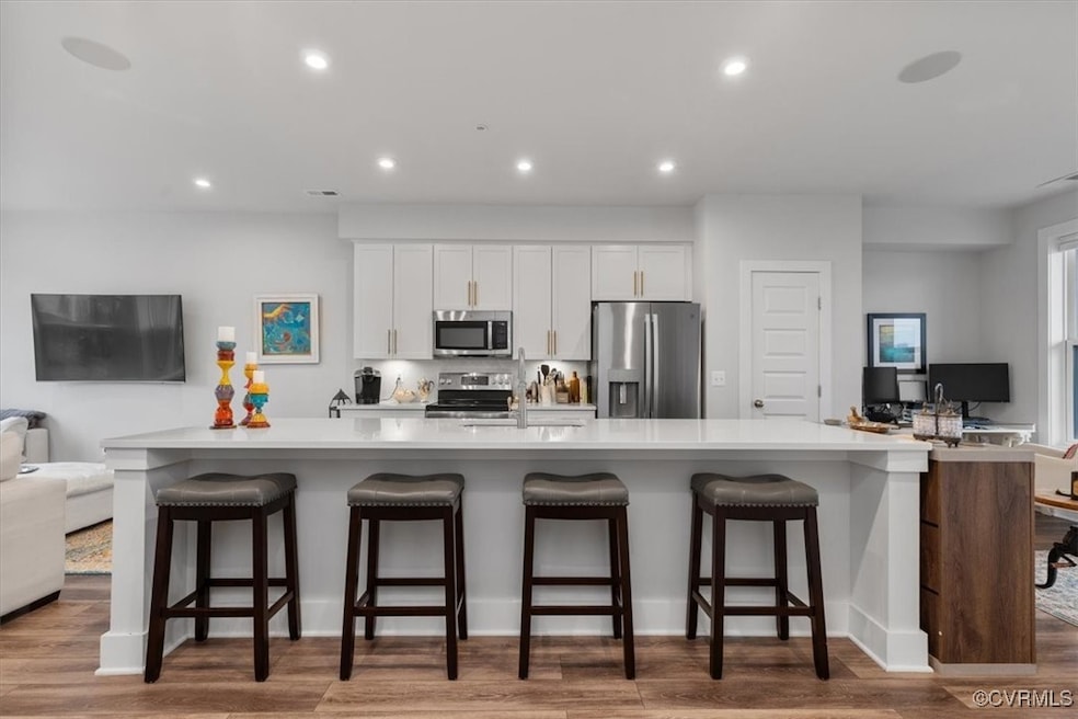 Kitchen featuring stainless steel appliances, a la
