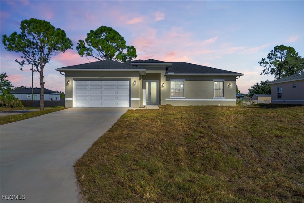3312 11th St W, Lehigh Acres, FL 33971 - photo 1