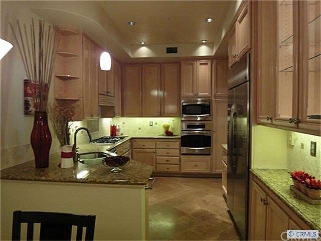 Beautiful Remodeled Kitchen features Granite Count