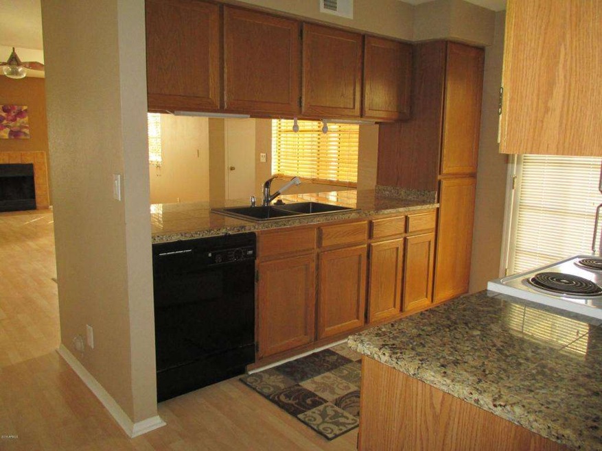 Kitchen looking into living room