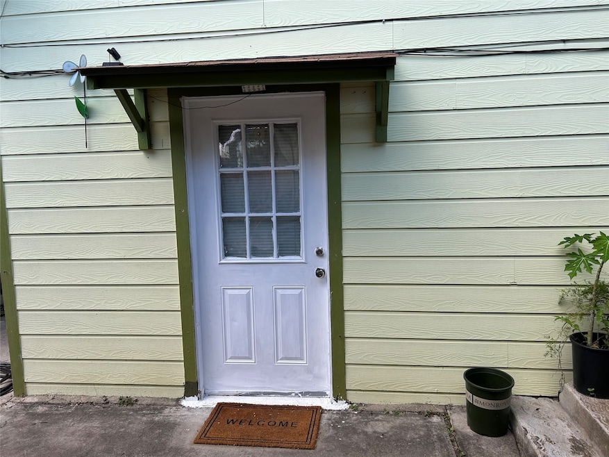 Front door view. (Bottom unit of a duplex)