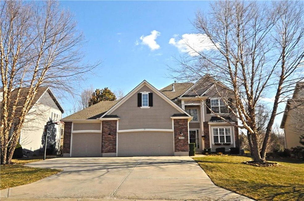 Gorgeous front elevation with 3 car garage with ma