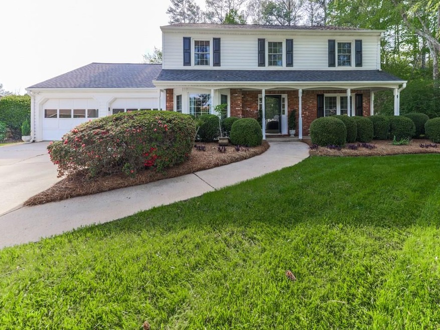 Roswell home features brick-front, low maintenance
