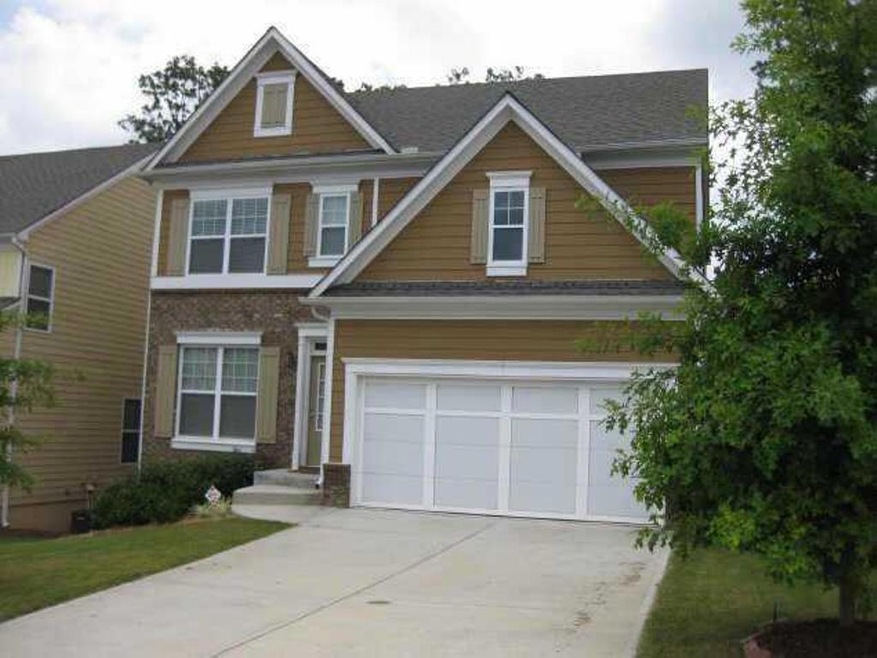 Craftsman-style home featuring a garage