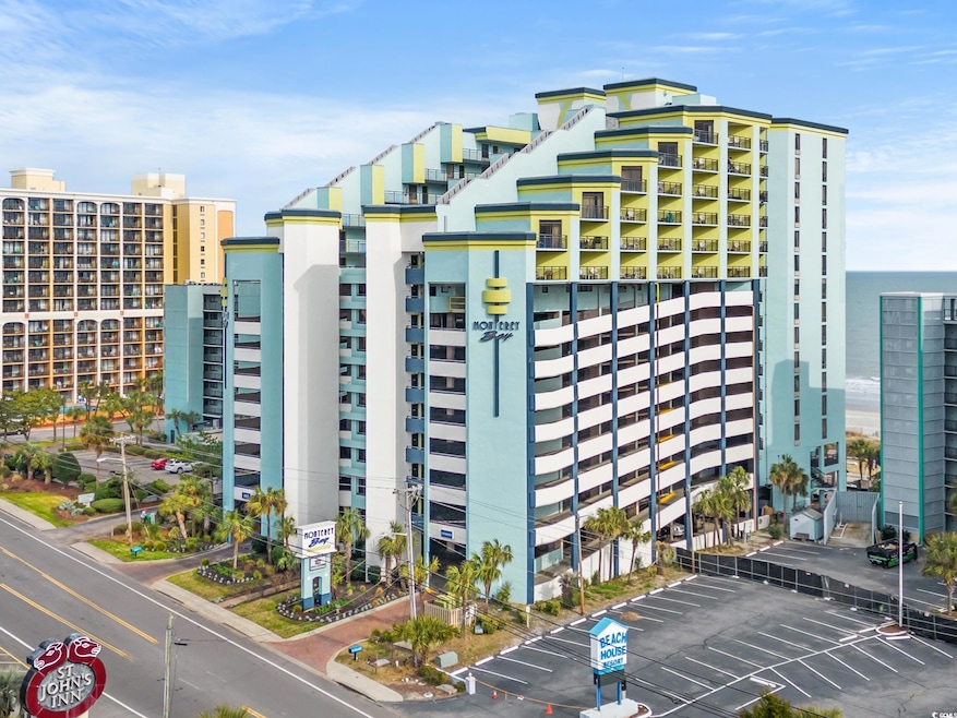 View of building exterior featuring a water view