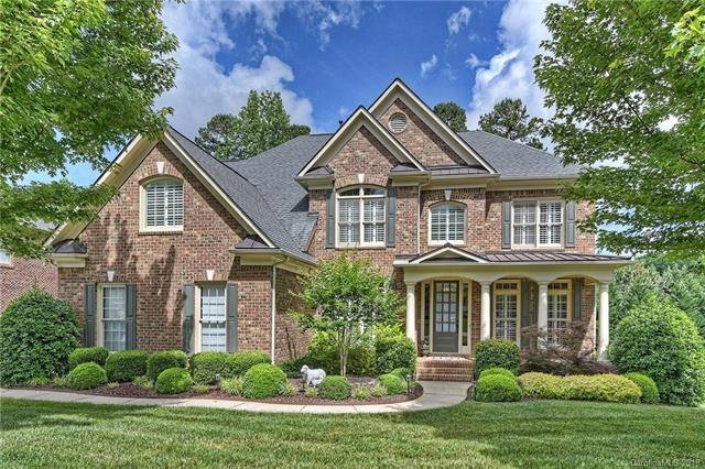 Welcome Home to this picture-perfect full-brick be