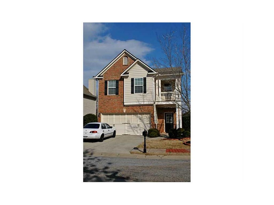 Exterior Front view with brick accent.