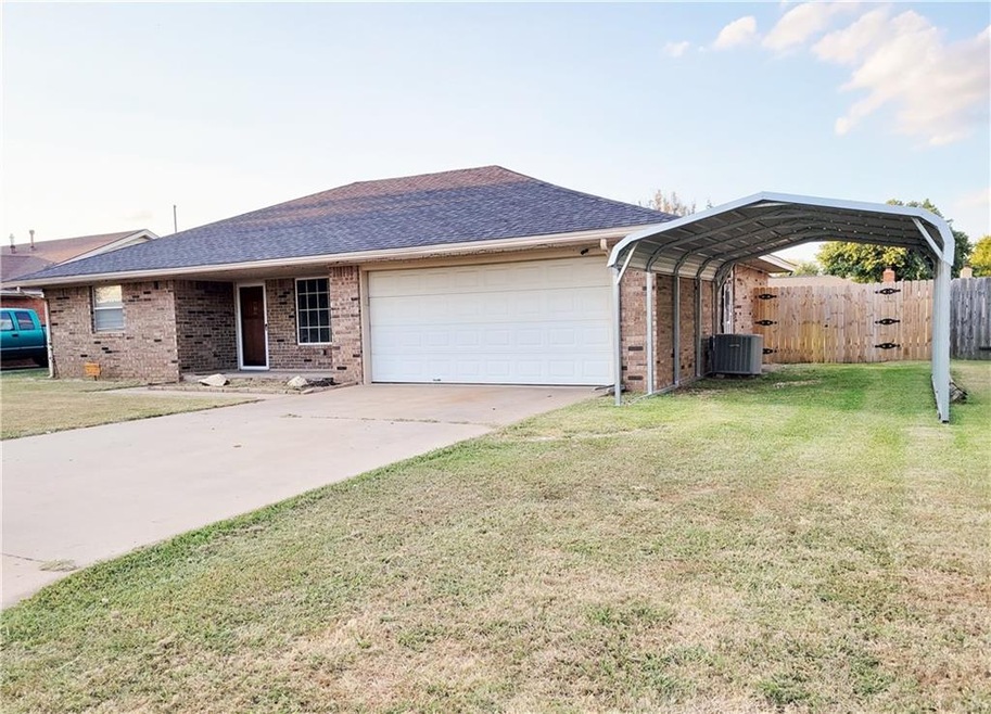 Welcome home, carport added 2021 for additional parking