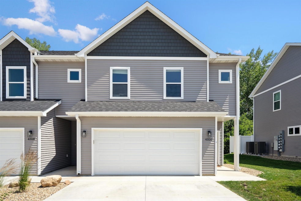 4320 Spruce Creek Dr unit 405, Cedar Falls, IA 50613 - photo 1