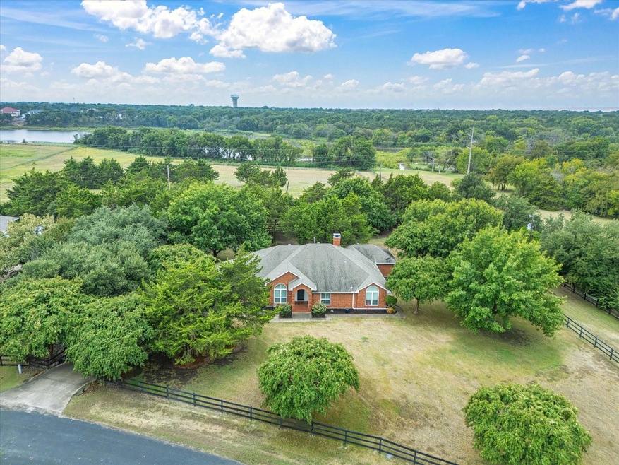Ranch-style house featuring a yard
