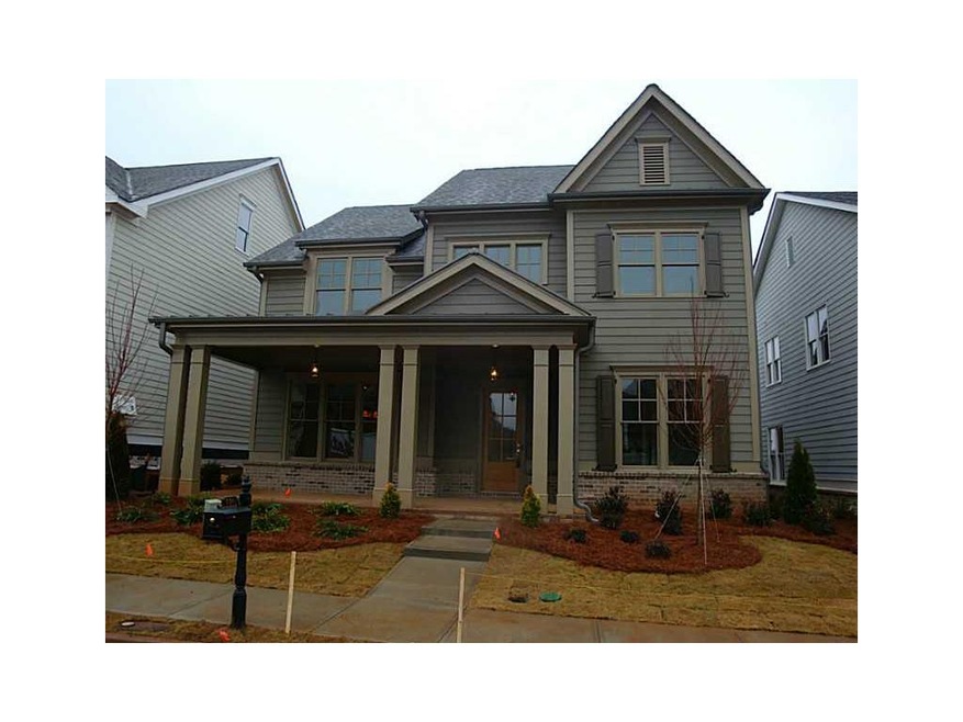 Exterior Front. Boy does this house look better no