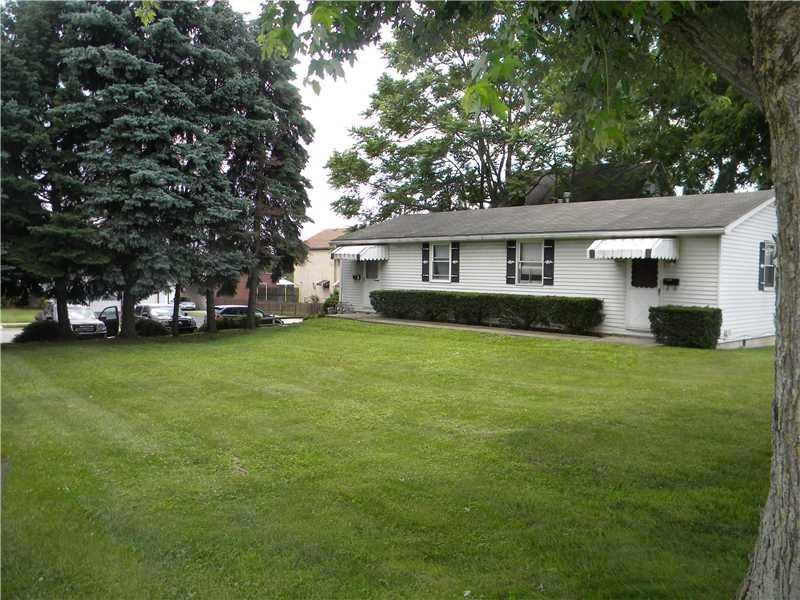 Exterior Front. Three unit home that could be easi
