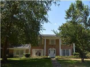 Lovely, columns and wide porch welcome you.