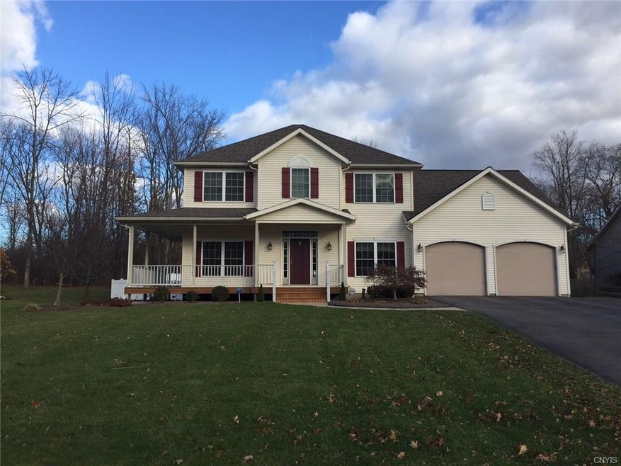 Stunning 5 bedroom home on 1/2 acre lot in Oswego.