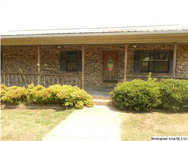 Beautiful full brick home with lovely covered fron