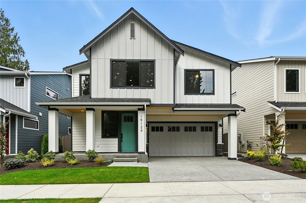 Plan 2552 Elevation A on another lot at Coyote Woods.  Exterior Paint scheme will vary from lot to lot. Ask for details.