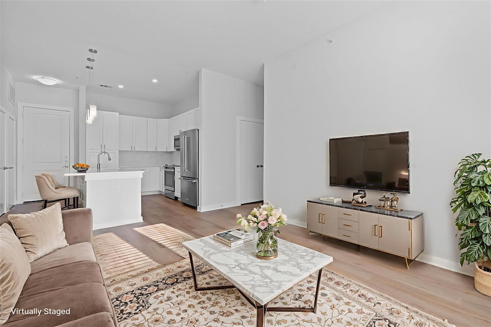 Virtually Staged Livingroom and Kitchen view