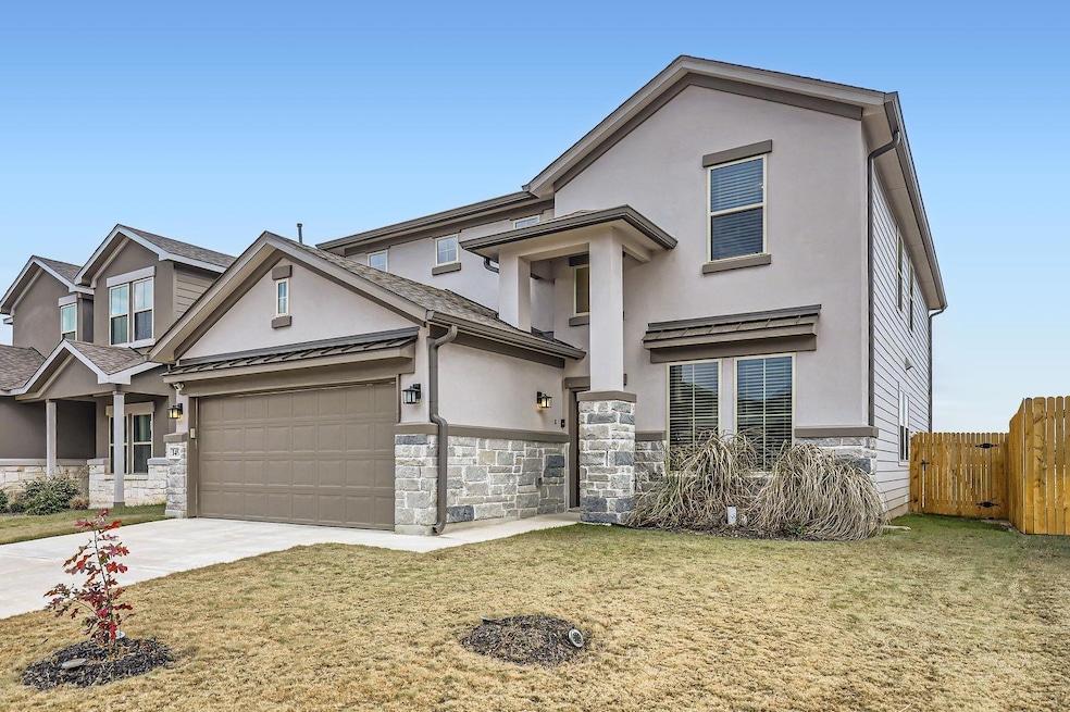 View of front of property featuring stucco siding