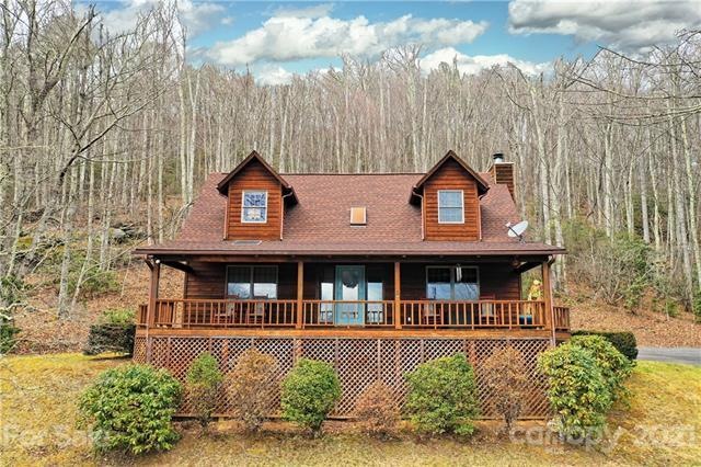 Drone photo - lovely front porch and upper level dormers!