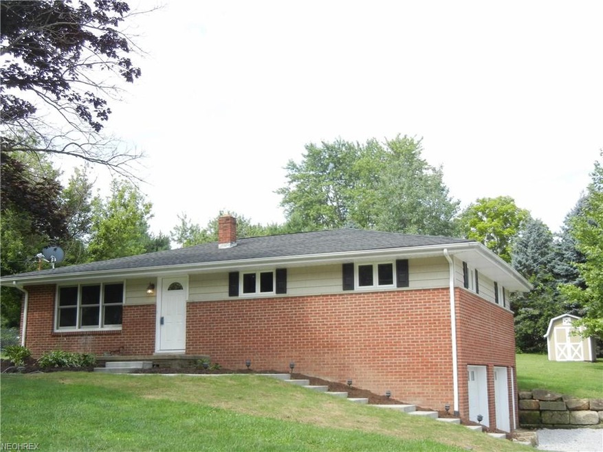 Brick, vinyl home on half acre in the country