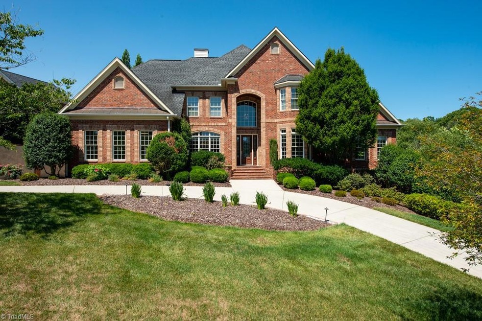 Home sits on a lovely spacious lot with circle drive