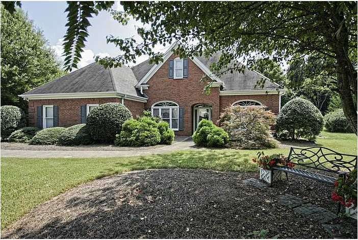 Exterior Front. Stepless Brick Ranch on cul-de-sac