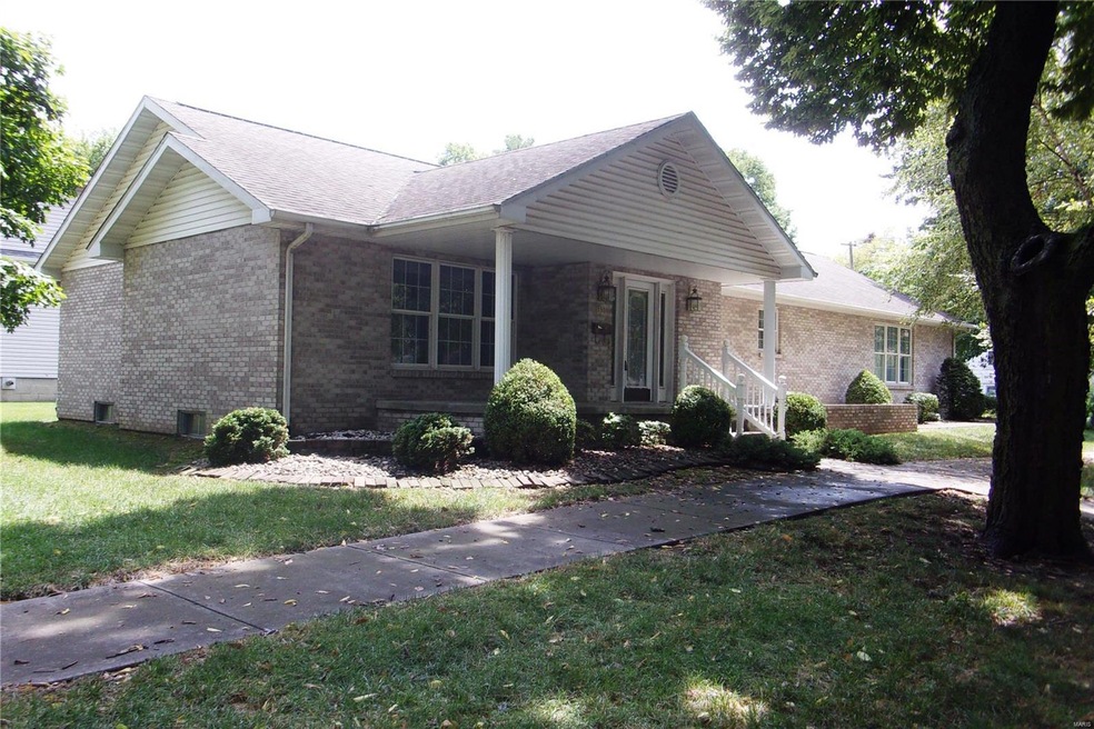 All brick ranch on a shady corner lot!