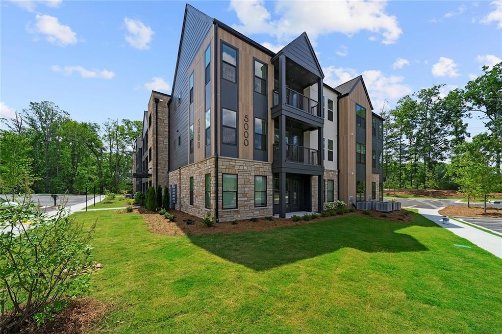View of property with central AC