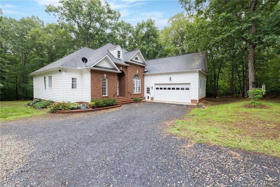 Cape cod home with an attached garage