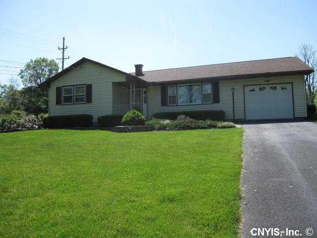 Exterior Front. Simple ranch with great lawns, lan