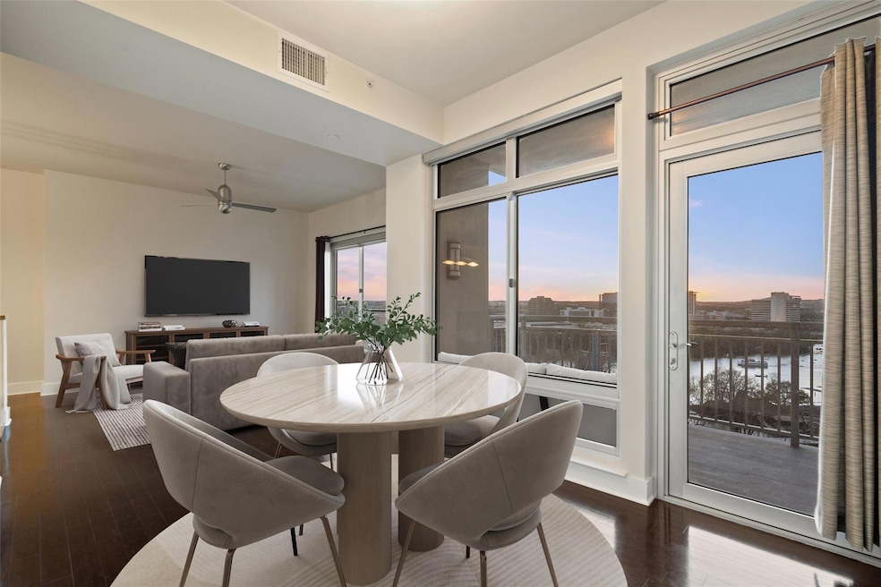 Dining room featuring dark wood finished floors, 