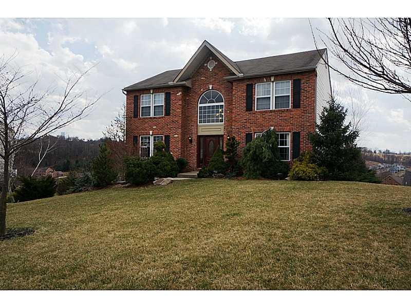 Exterior Front. Stately brick front and double doo