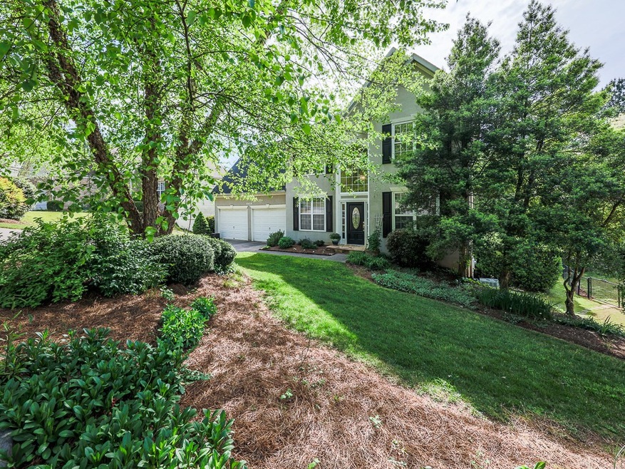 Front of home displaying large front yard and prof