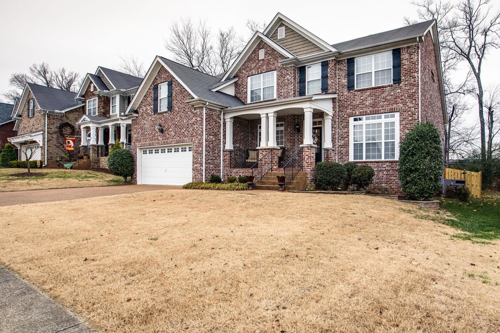Beautiful Brick home with rocking chair front porch in Tanyard Springs Subdivision. Conveniently located near shopping and I840