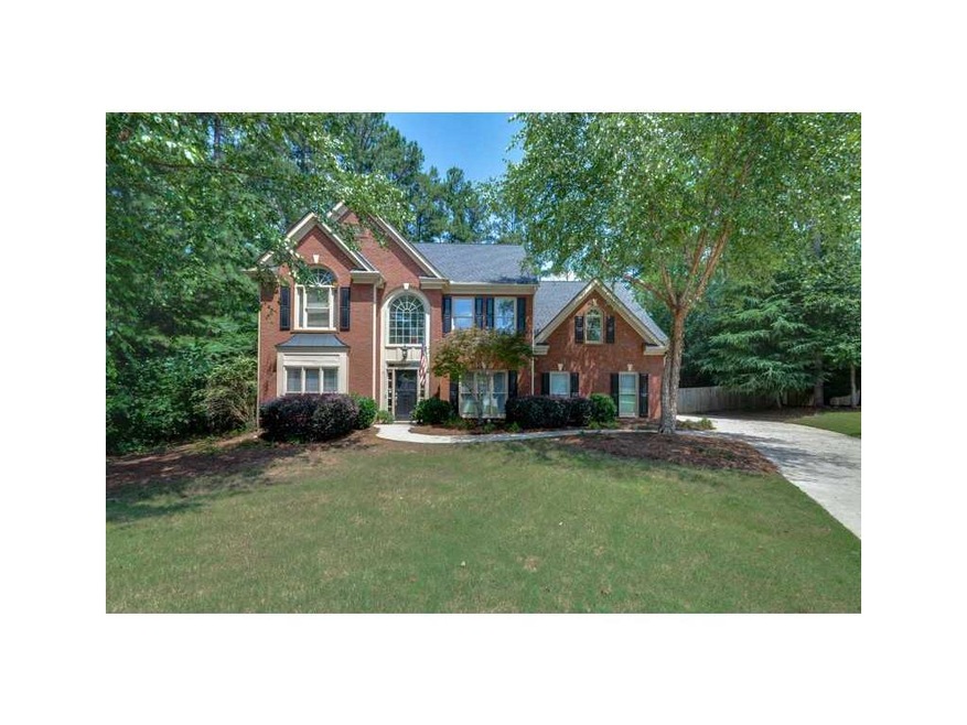 Exterior Front. Executive home with brick front, s