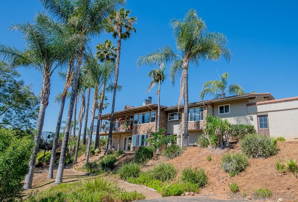 There are over 2 acres of property with many level