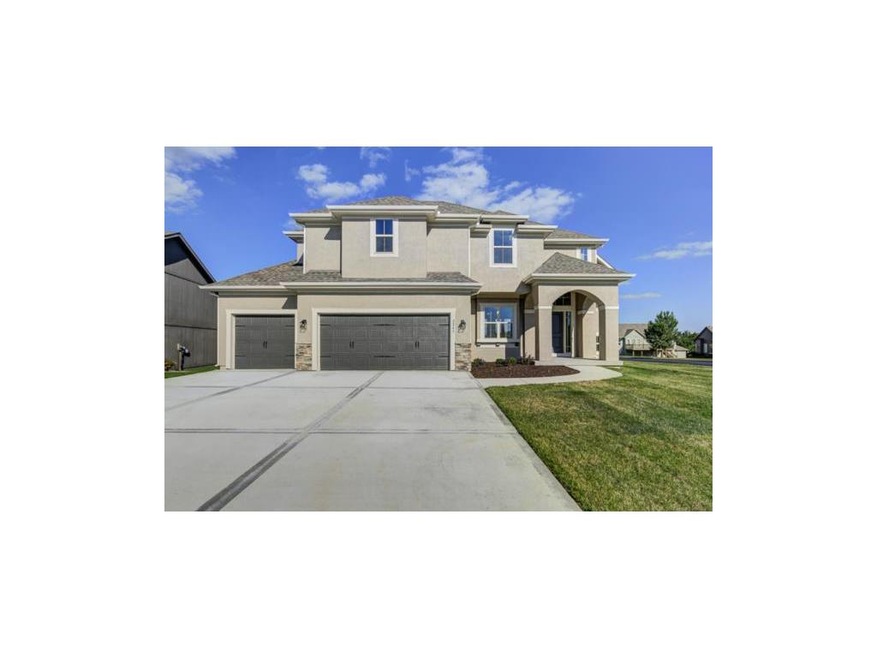 Majestic home sits on a large corner lot.
