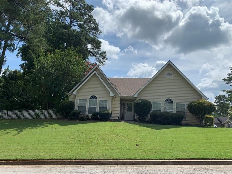 This beauty has great curb appeal with its roof pe